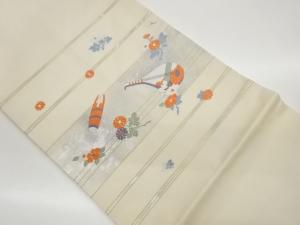 横段に琵琶・笙・草花模様織出し名古屋帯